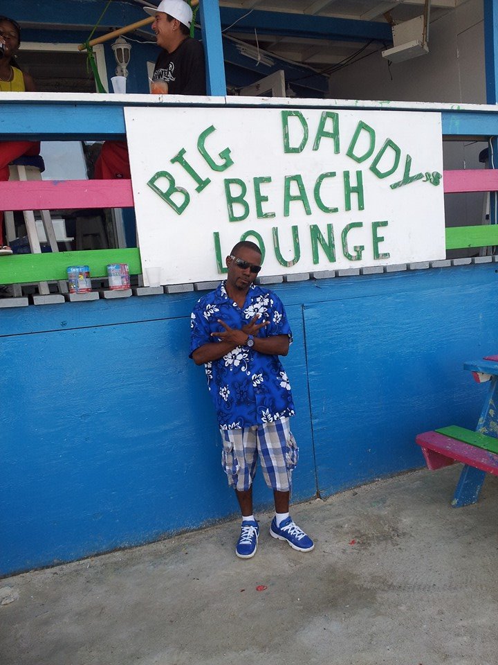"Smurf" posing in front of Big Daddy's Beach Lounge