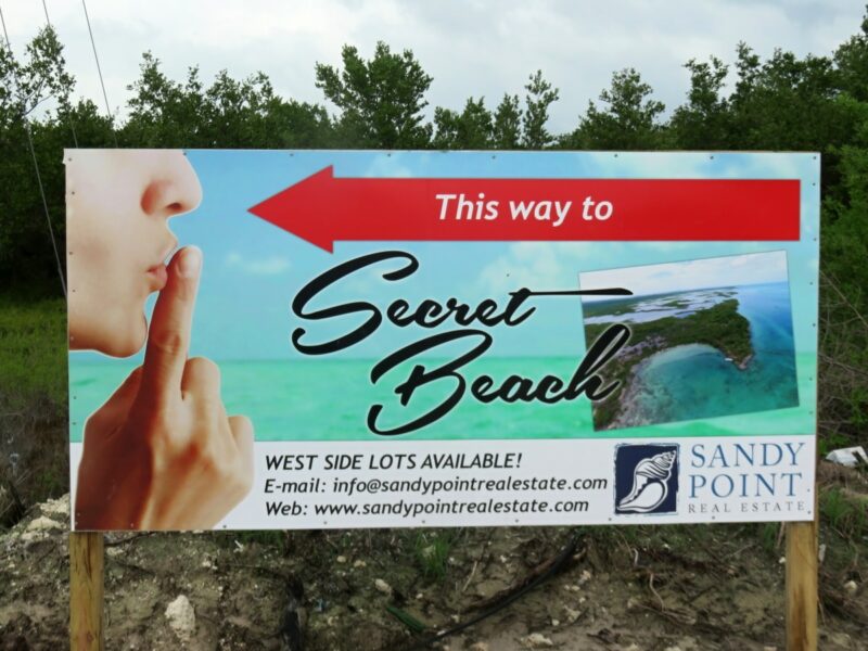 secret-beach-sign