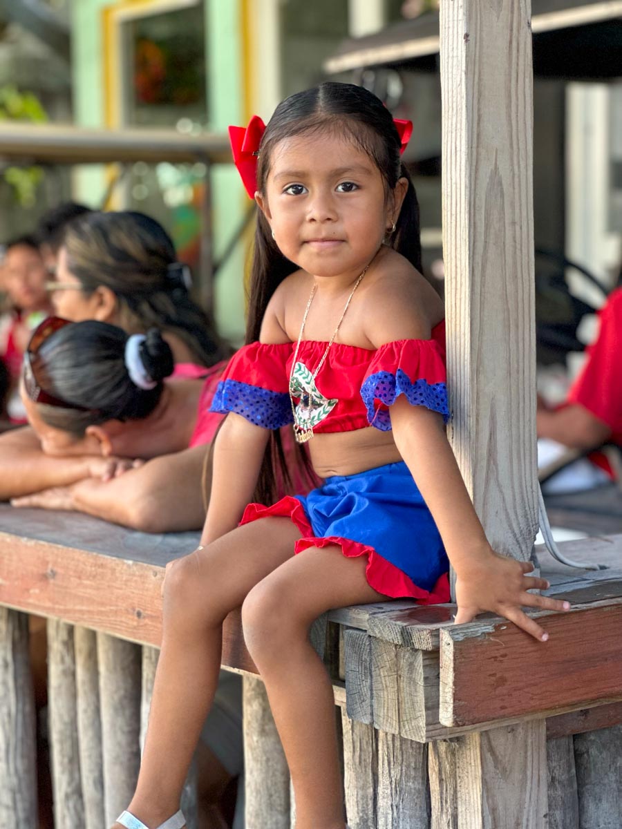 Cutest little girl dressed in Belizean finery