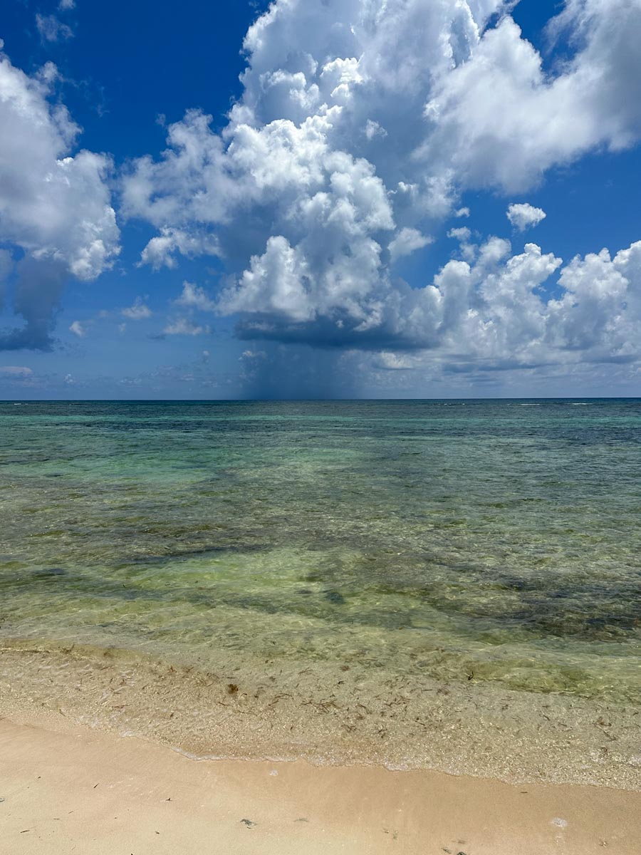 One little rain cloud over the reef