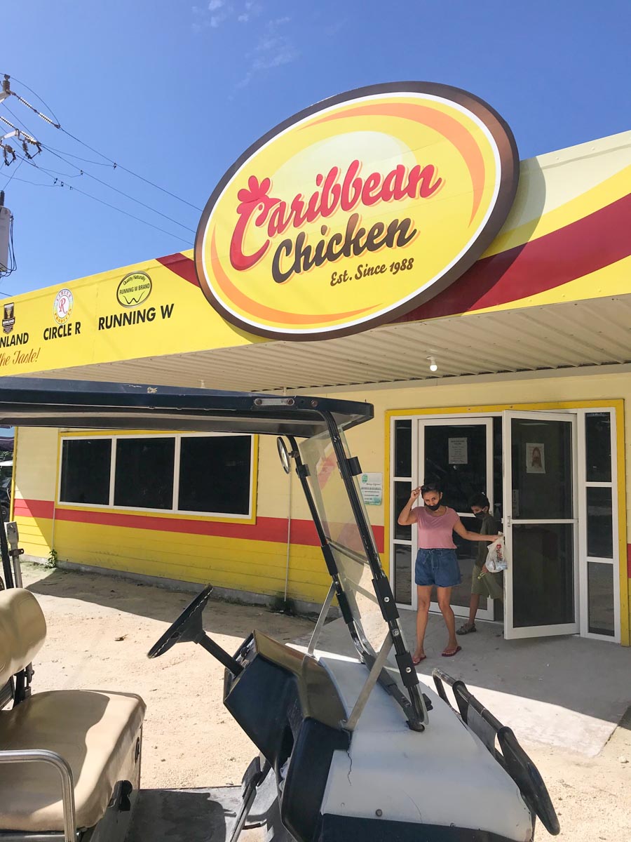 Sign for the Caribbean Chicken store in San Pedro